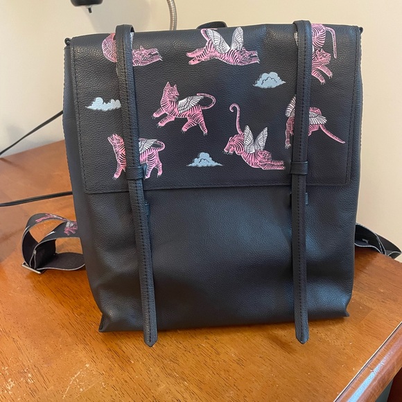 Min & Mon Handbags - Black Min & Mon Leather Backpack with Pink Flying Tiger Design